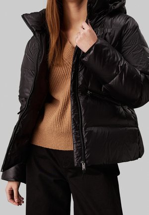 Chaqueta de plumas - black