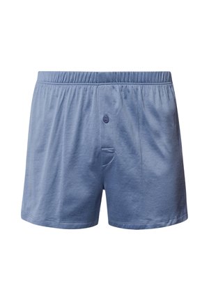 Jasnoniebieskie bawełniane szorty bokserki z elastycznym pasem, przednim zapięciem na guzik i bocznymi kieszeniami. Gładka textura z minimalnymi detalami szwów.