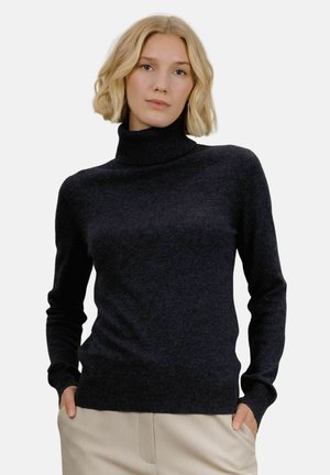 Mørkegrå genser med høy hals laget av myk strikket stoff med lange ermer, tettsittende design og ribbede mansjetter og kant.