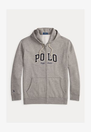 Hallide hallitus, mis on valmistatud puuvillasegusest kangast. Omab nööriga kapuutsi, esikotte, suurt "POLO" logo tumesinisel taustal ja väikest polo mängija embleemi varrukal.
