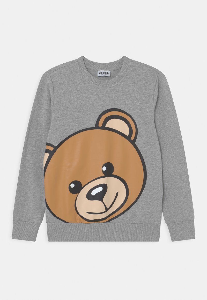 Sweat-shirt gris à manches longues avec un grand motif de visage d'ourson souriant sur le devant, et un col, des poignets et un ourlet côtelés.