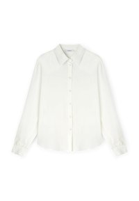 Chemise blanche à boutons, fabriquée en tissu lisse, avec un col classique, des manches longues à poignets arrondis et un ourlet droit.