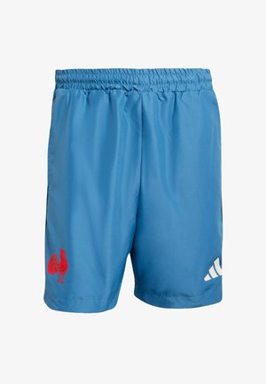 Niebieskie sportowe szorty wykonane z lekkiego materiału, z elastycznym pasem, z logo czerwonego koguta i białymi akcentami w postaci pasków.