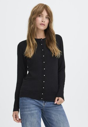 Black cardigan made of knit fabric with a round neckline. Features long sleeves and a row of pearl-like buttons down the front.