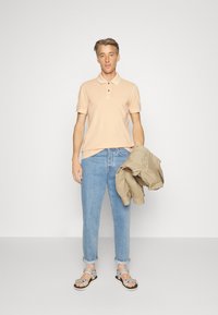 BOSS Polo - light/pastel orange