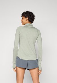 New Balance ATHLETICS GRID 1/2 ZIP - Hosszú ujjú felső - garter snake heather