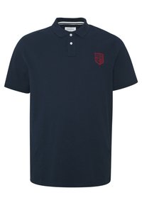 Navy blue polo shirt made of cotton, featuring a two-button placket, short sleeves, and a red embroidered logo on the left chest.