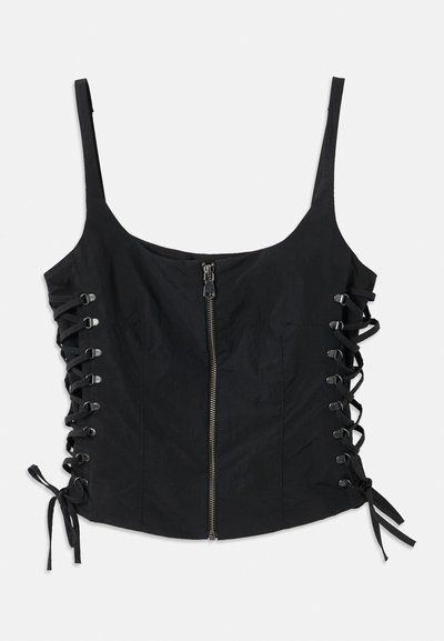 Top smanicato nero con zip frontale e lati con lacci legati con fiocchi, dotato di spalline sottili e una silhouette aderente.