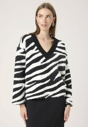 Vesta - black and white animal