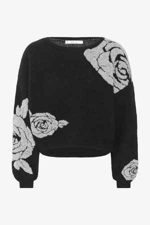 Pull noir à coupe décontractée, avec des motifs floraux gris d'un côté et un tissu en maille texturée. Encolure ronde et poignets côtelés.
