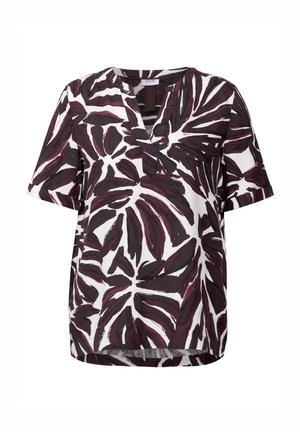 Kortärmad blus med V-ringning i vitt med ett stort mönster av mörkröda blad. Lättviktig tygkvalitet med avslappnad passform.