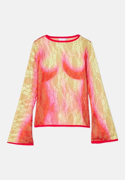 Lace long-sleeve top featuring a gradient of yellow, pink, and red, with a round neck and flared sleeves. The trim is bright red.