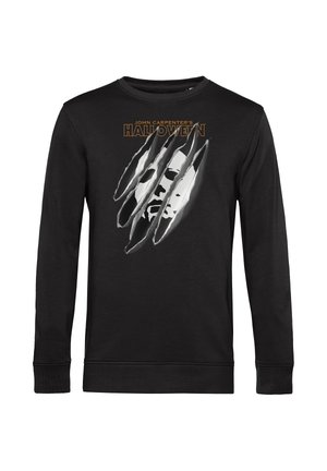 Zwarte sweatshirt met lange mouwen, voorzien van een grafisch ontwerp van een gezicht met klauwsporen. De tekst luidt "John Carpenter's HALLOWEEN" in het geel. Zacht materiaal.