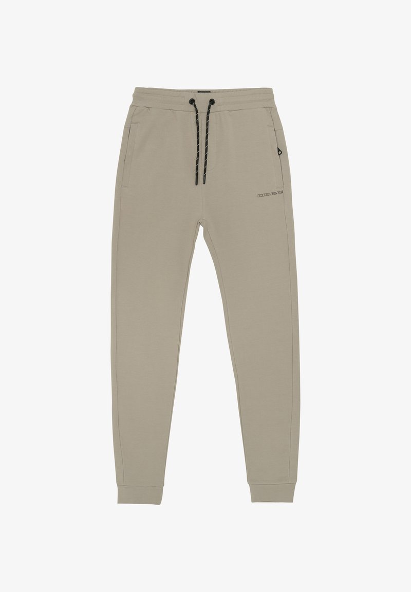 Beige sportbroek gemaakt van zachte stof, met een trekkoord in de taille, zijzakken en een logo gedrukt op het been. Slanke pasvorm.