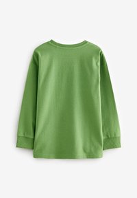 T-shirt en coton vert à manches longues avec un col rond, des poignets côtelés et une texture douce. Design uni, sans motifs ni embellissements.