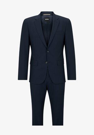 Navy blue suit with a single-breasted jacket, two-button closure, and side pockets. Smooth fabric with subtle texture and tailored fit.