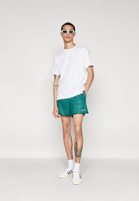 adidas Originals 80S SPRINT - Treniņtērpa apakšdaļas - collegiate green