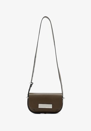 Brown leather crossbody bag with a slim design, silver hardware accent, and an adjustable strap for versatile wear.