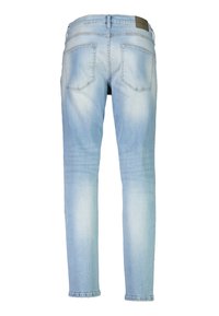 Heledad sinine teksapüksid otseppaidega, millel on kaks tagakotti ja tekstuuriga vööline silt. Pleekinud viimistlus põlvede lähedal.