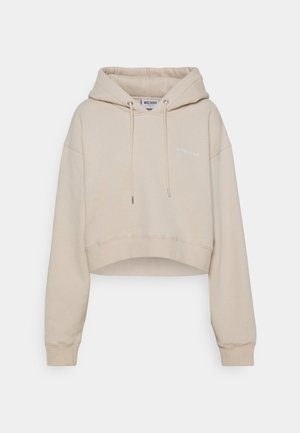 Beige värinen lyhyt huppari, jossa pitkät hihat, etunaru kiristykset, resorit hihansuissa ja pieni logoteksti vasemmassa rinnassa.