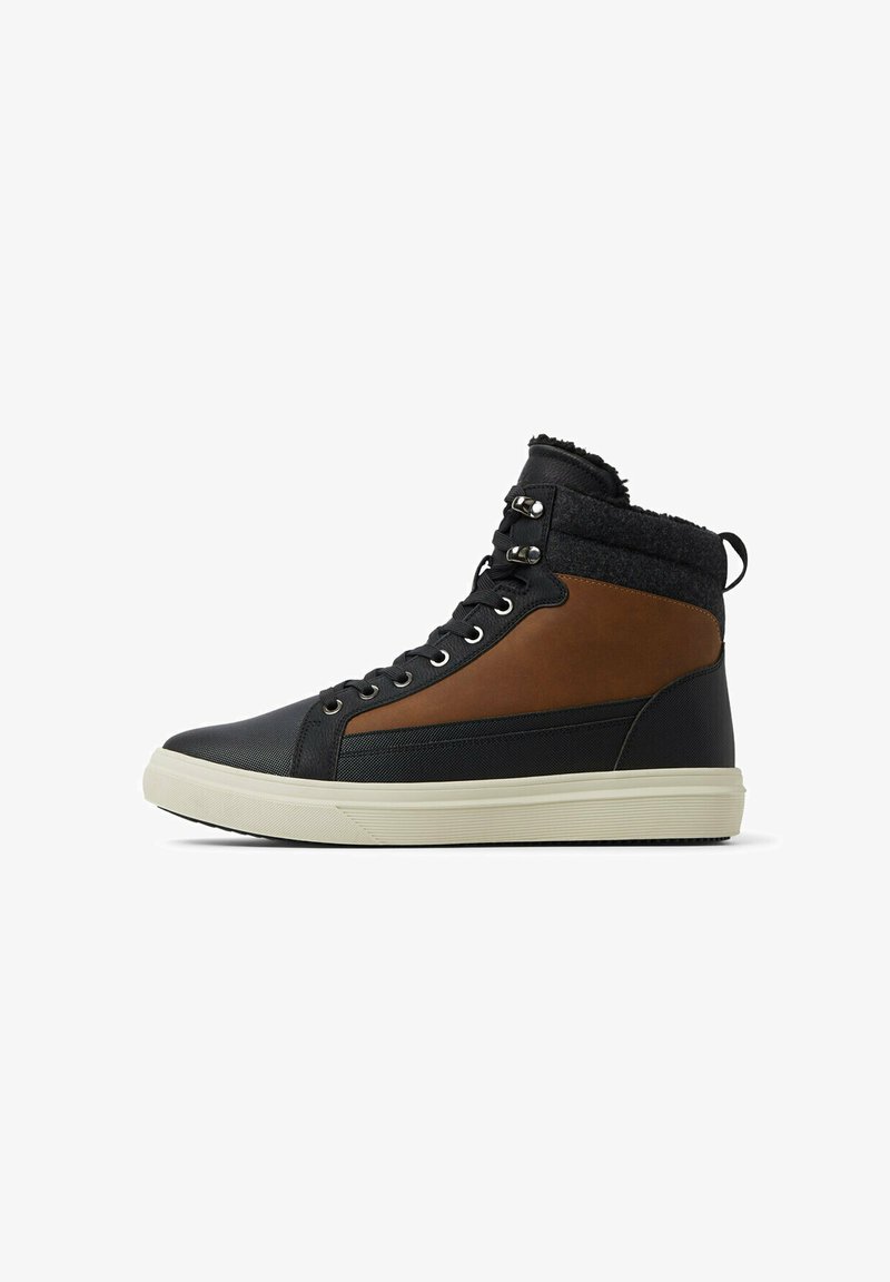 High-top sneakers featuring a black leather base, brown leather accents, textured gray fabric collar, and white rubber sole.