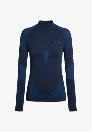Marineblauw thermisch shirt met lange mouwen en een hoge hals, met contrasterende blauwe, gestructureerde panelen en een aangesloten pasvorm. Logo zichtbaar op de borst.