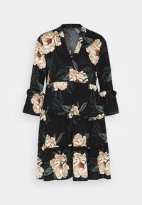 Svart blommig klänning med stora beige och bruna blommor, en omslagdesign, trekvartsärmar och volangdetaljer i nederkant.