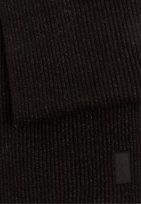 Black ribbed knit scarf with metallic flecks, featuring a rectangular logo patch in the lower corner, soft texture, and layered appearance.
