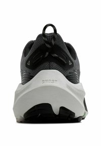 Gray running shoe with textured mesh upper, black accents, prominent logo on heel, and white midsole with rubber outsole for traction.