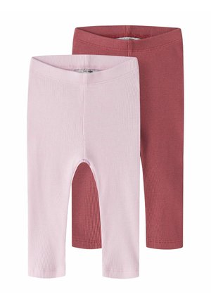 Deux paires de leggings pour bébés en maille côtelée, l'une en rose clair et l'autre en rose doux, présentées pliées avec des ceintures élastiques.