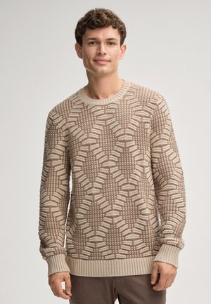 Strickpullover in Beige und Hellbraun mit geometrischem Muster. Rippbündchen und -saum, runder Halsausschnitt, strukturierter Stoff.