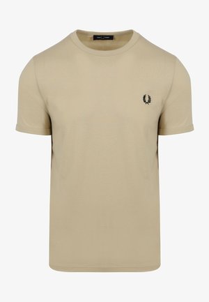 T-shirt beige manches courtes col rond avec petit logo couronne de laurier noir sur le côté gauche de la poitrine.