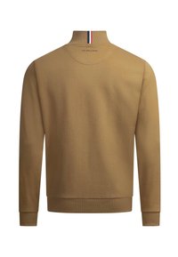 Brown long-sleeve pullover with ribbed cuffs and collar, featuring a vertical red, white, and blue stripe on the back of the neck and small "U.S. Polo Assn." text.