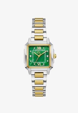 Montre-bracelet carrée en argent et or avec un cadran vert, des aiguilles en or, des index en diamant et un bracelet à maillons métallique bicolore.