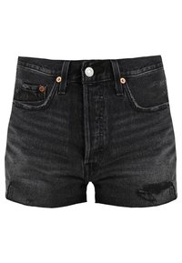 Black denim shorts with a high waist, front button closure, and distressed detailing on the hem. Five-pocket design with copper accents.