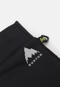 Sort stofhandske med en tekstureret overflade, prydet med et hvidt bjerglogo og ordet "BURTON." Indeholder et løkke-tag med en grøn accent.