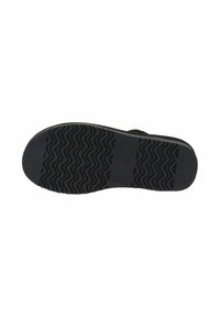 Suola di scarpa in gomma nera con un motivo di battistrada ondulato. Texture liscia e forma arrotondata. Nessun marchio visibile o caratteristiche aggiuntive.