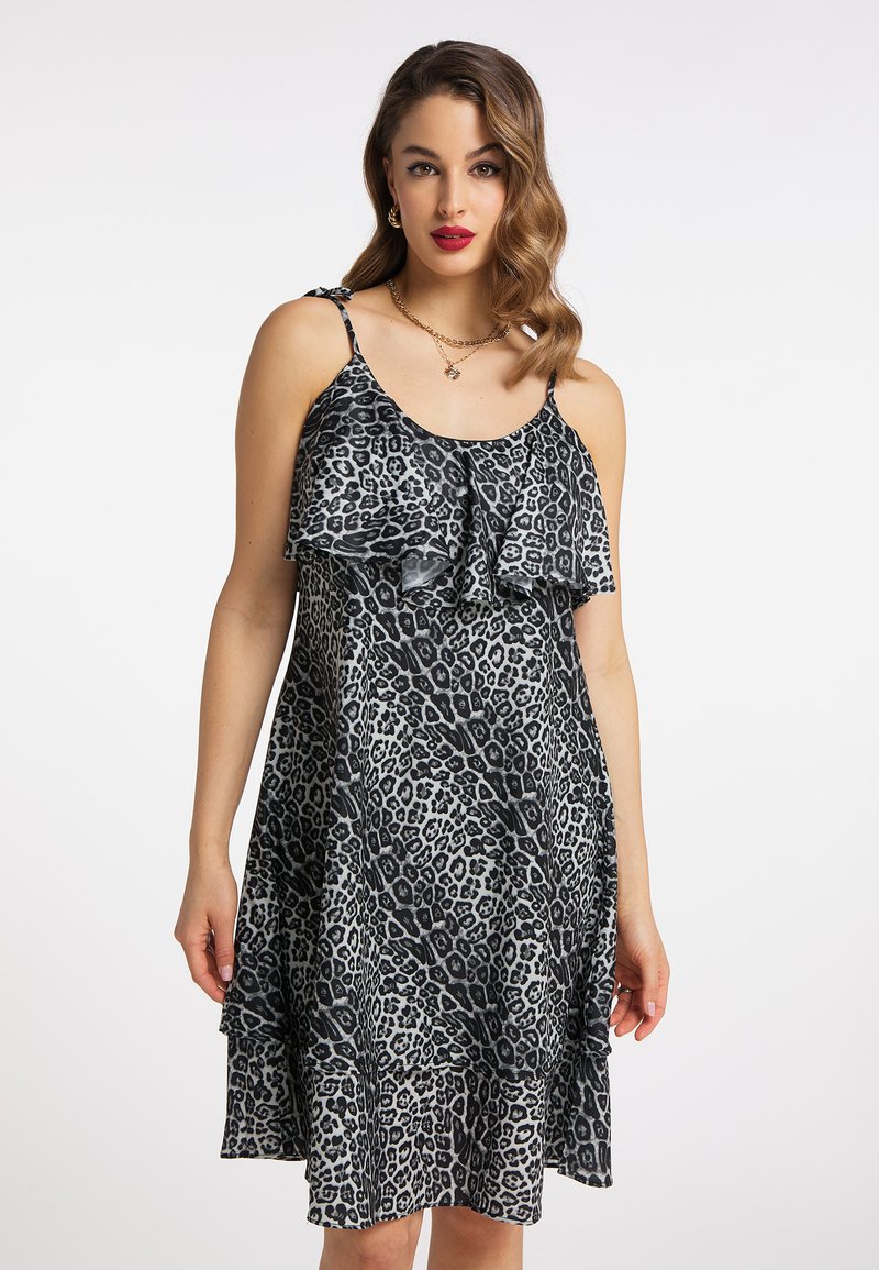 Rochie cu imprimeu leopard negru și gri, cu volane stratificate, bretele subțiri și o siluetă evazată. Fabricată dintr-un material ușor, cu textură.
