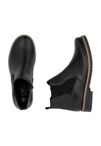 Bottines noires en cuir avec panneaux élastiques sur les côtés, semelle en caoutchouc texturée et détail de logo sur le côté. Fini lisse avec une construction robuste.