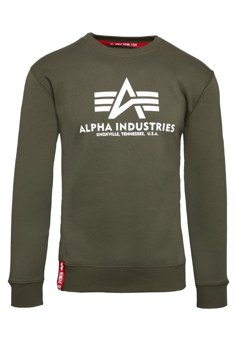 Olive green sweatshirt with a crew neckline and long sleeves. Features a white "Alpha Industries" logo and red accent tag at the hem.