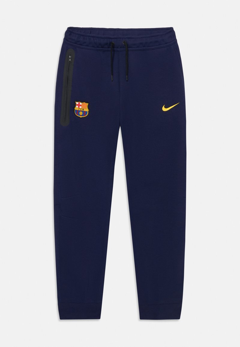 Navy sweatpants in cotton blend featuring an elastic waistband, drawstring, zip pocket, FC Barcelona logo, and Nike swoosh in yellow.
