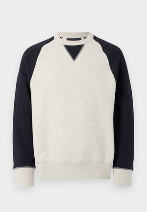 Sweat-shirt à col rond avec corps gris clair, manches raglan noires et poignets et ourlet gris.