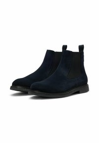 Botas Chelsea de ante azul marino con paneles laterales elásticos negros y tiradores, con puntera redondeada y suela de goma texturizada.