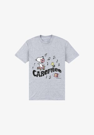 Maglietta grigia con Snoopy e Woodstock che pattinano, indossano cuffie, circondati da note musicali e dal testo «Carefree».