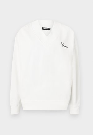 Sudadera de algodón blanca con un escote en V, puños y dobladillo acanalados. Presenta un pequeño logo negro bordado en el lado izquierdo.