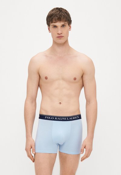 Svetlomodré boxerky s tmavomodrým elastickým pásom, na ktorom je logo "POLO RALPH LAUREN". Mäkká tkanina a priliehavý strih.