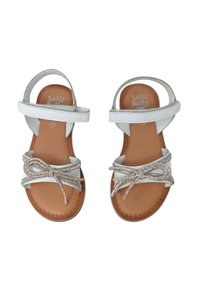 Sandali bianchi con nodo decorativo argentato, cinturini regolabili e soletta imbottita color beige. Presentano una suola piatta e liscia. Taglia 30.