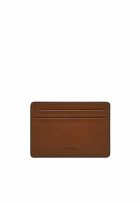 Brown leather card holder with four card slots, smooth texture, subtle stitching, and embossed "FOSSIL" logo at the bottom.
