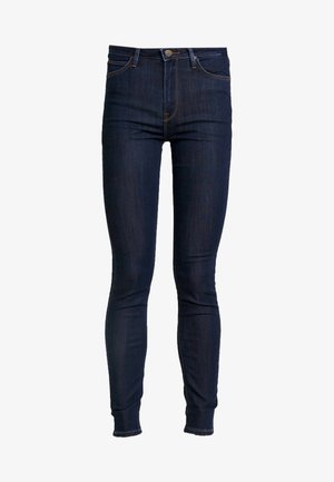 Mørkeblå skinny jeans lavet af denim, med en mellemhøj talje, klassisk 5-lommer design og kontraststing detaljer.