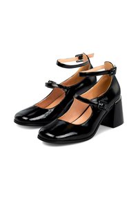 Scarpe Mary Jane in vernice nera con tacco a blocco e doppie fibbie alla caviglia, mostrate affiancate su uno sfondo bianco.